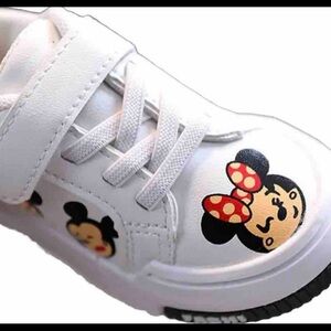 Cute  NEW white Minnie Mouse baby sneakers. Size 21 UK , USA size 5. (12/18M)